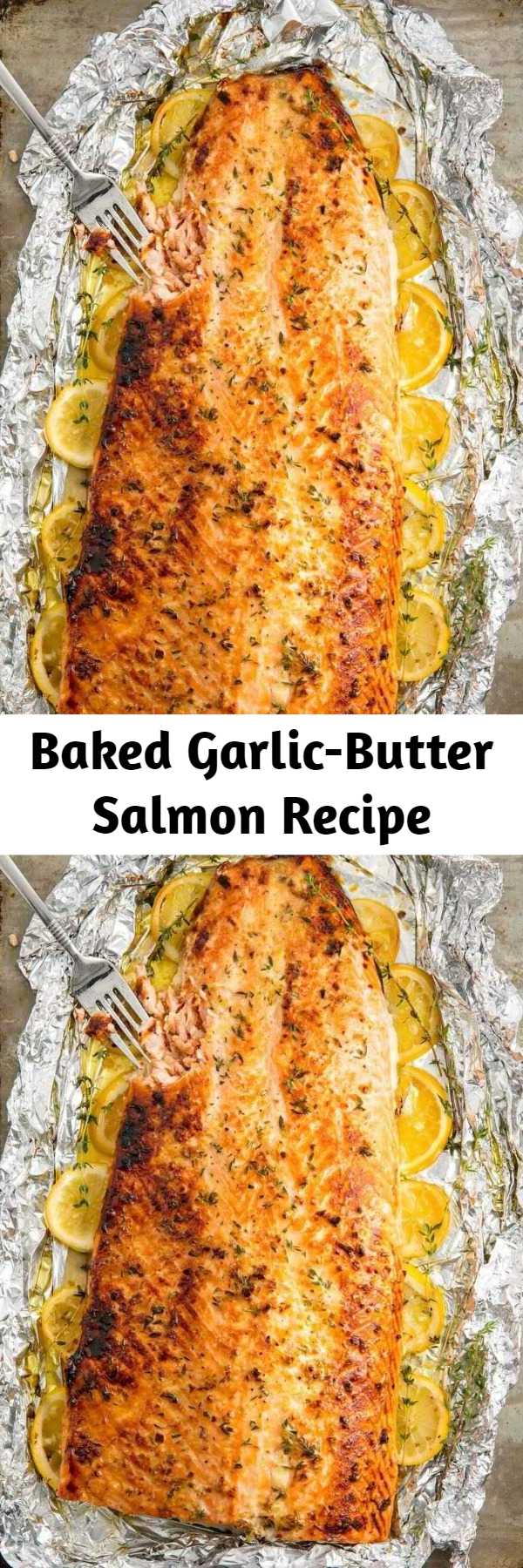 Baked Garlic-Butter Salmon Recipe - This healthy baked salmon is the best way to feed a crowd. There's no skillet cooking at all—everything is oven-baked in foil, making prep and cleanup a breeze. Considering how beautiful, easy, and dang delicious this hunk of fish is, we believe it might just be the best baked salmon recipe IN THE WORLD. This is the only baked salmon recipe you'll ever need. #fish #fishrecipes #salmon #salmonrecipes #easyrecipes #healthyrecipes