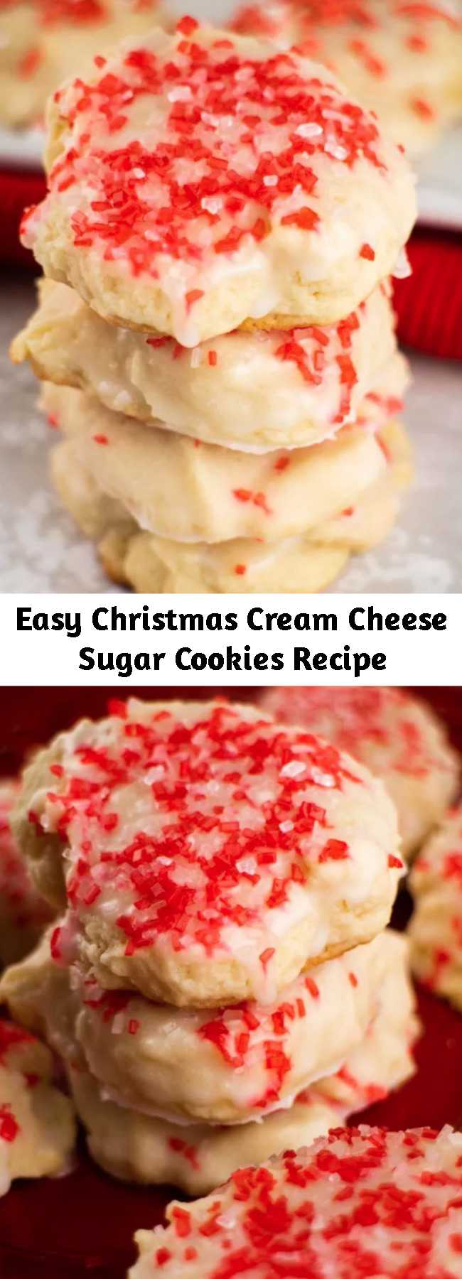 Easy Christmas Cream Cheese Sugar Cookies Recipe - CREAM CHEESE Christmas Sugar Cookies! These easy to make holiday cookies are so soft because they're made with cream cheese! Dip each cookie into vanilla sugar glaze and top with red and white sprinkles!